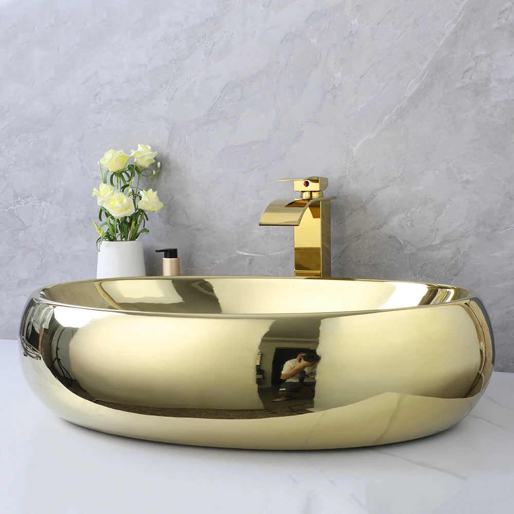 KEMAIDI Luxury 23 Inch Bathroom Vessel Sink Gold Ceramic Sinks Above Counter Oval Bathroom Sink with Gold Waterfall Faucet Mixer